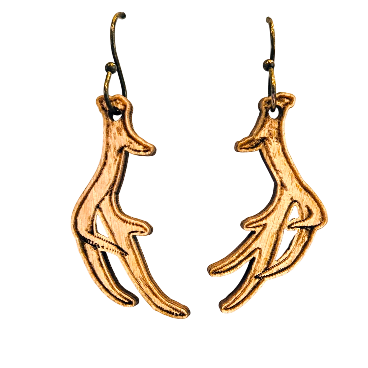 A pair of dangling earrings shaped like stylized deer antlers, made of textured gold-toned metal with dark hooks, shown on a plain white background.